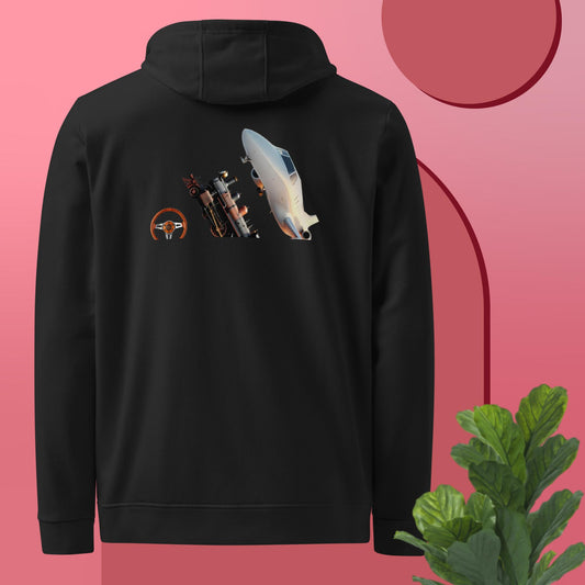 Vista trasera de la sudadera negra con capucha de la colección Adidas Bofetadas, dedicada a los pilotos. Se muestran las tres bandas de Adidas, cada una con un diseño diferente: un volante, una máquina de tren y un avión.